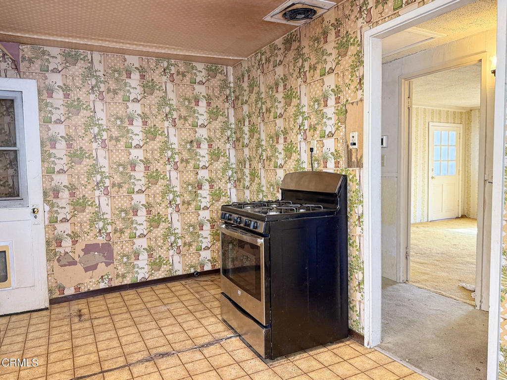 561 Tico Road Ojai, CA 93023 - Photo 19 of 59 a view of a utility room with washer and dryer