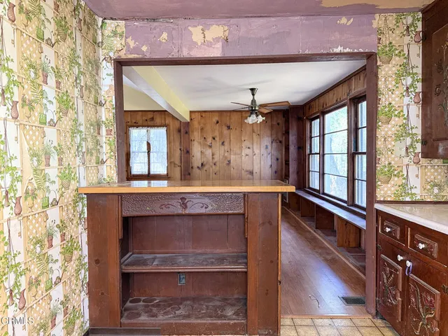 a spacious bathroom with a double vanity sink and a mirror