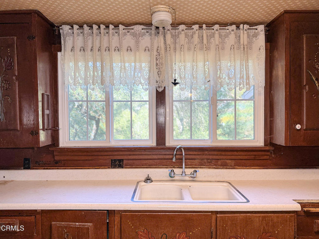 561 Tico Road Ojai, CA 93023 - Photo 22 of 59 a view of a kitchen with a sink and a window