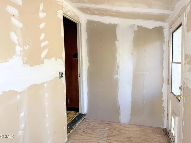 a view of a room with a window