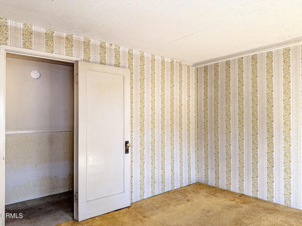 561 Tico Road Ojai, CA 93023 - Photo 30 of 59 a view of a room with a door and stairs
