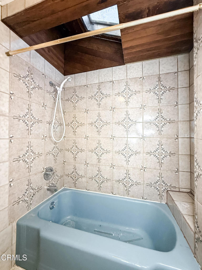 561 Tico Road Ojai, CA 93023 - Photo 32 of 59 a bathroom with a bathtub and shower