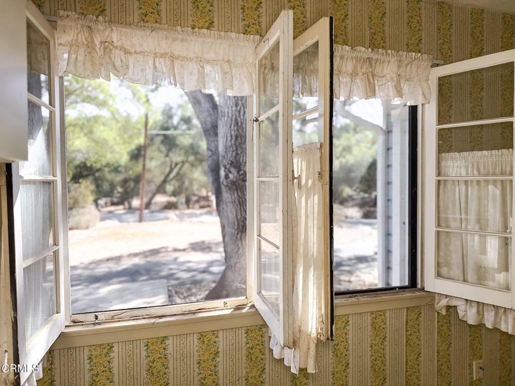 561 Tico Road Ojai, CA 93023 - Photo 35 of 59 a view of a glass door and a window