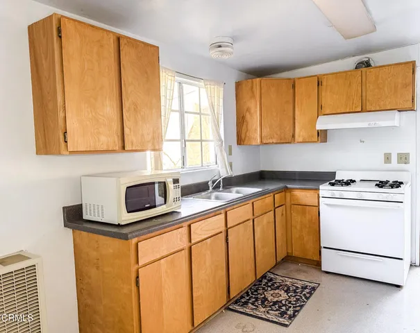 a view of room with a flat screen tv