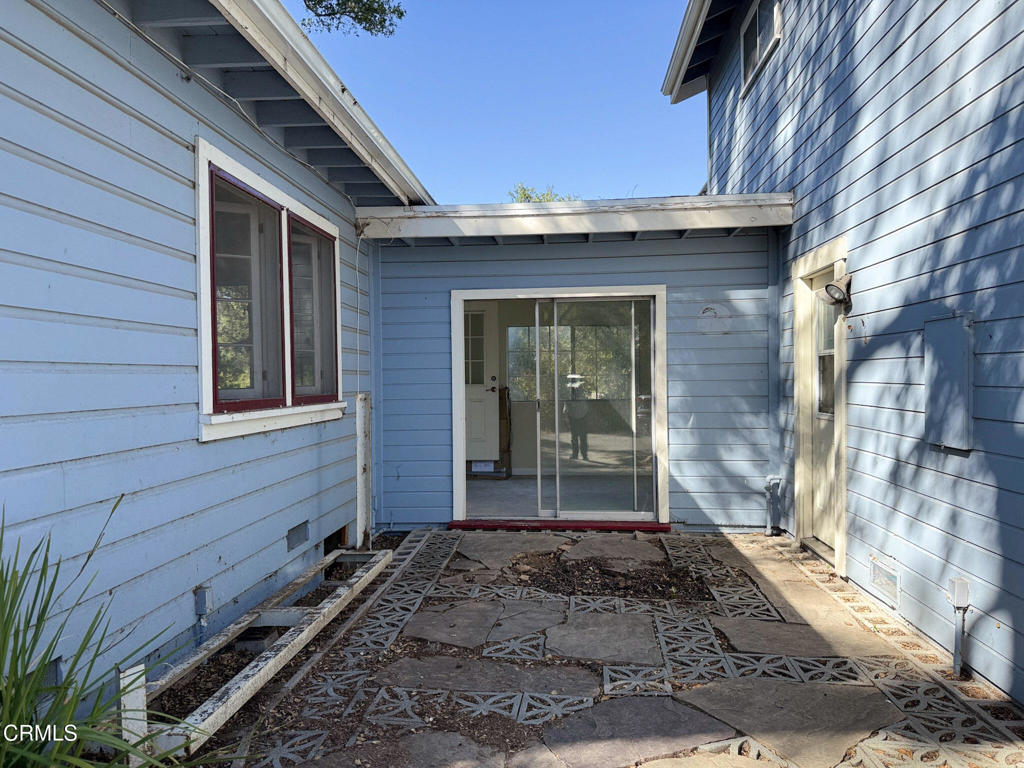 561 Tico Road Ojai, CA 93023 - Photo 50 of 59 a view of a brick house with many windows