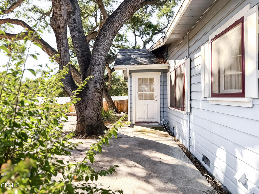 561 Tico Road Ojai, CA 93023 - Photo 6 of 59 a front view of a house with a tree in the yard