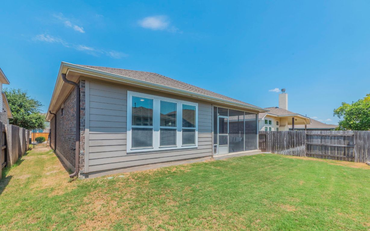 105 Penna Lane Georgetown, TX 78628 - Photo 28 of 39 a house view with a garden space