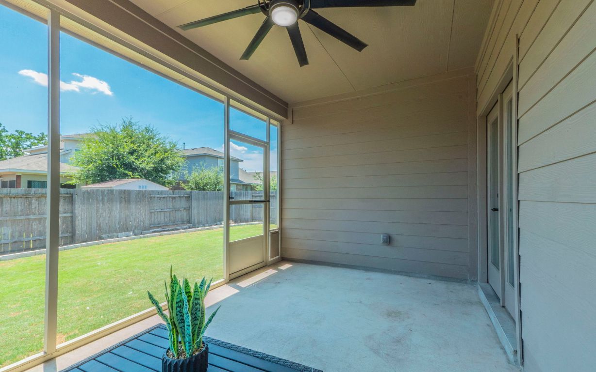 105 Penna Lane Georgetown, TX 78628 - Photo 32 of 39 a view of a room with wooden floor and potted plant