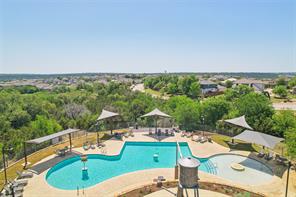 105 Penna Lane Georgetown, TX 78628 - Photo 34 of 39 a view of a swimming pool with a patio
