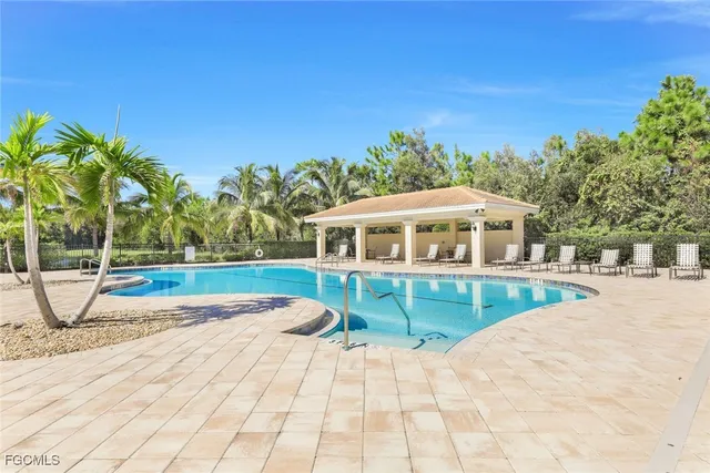 a view of a house with swimming pool