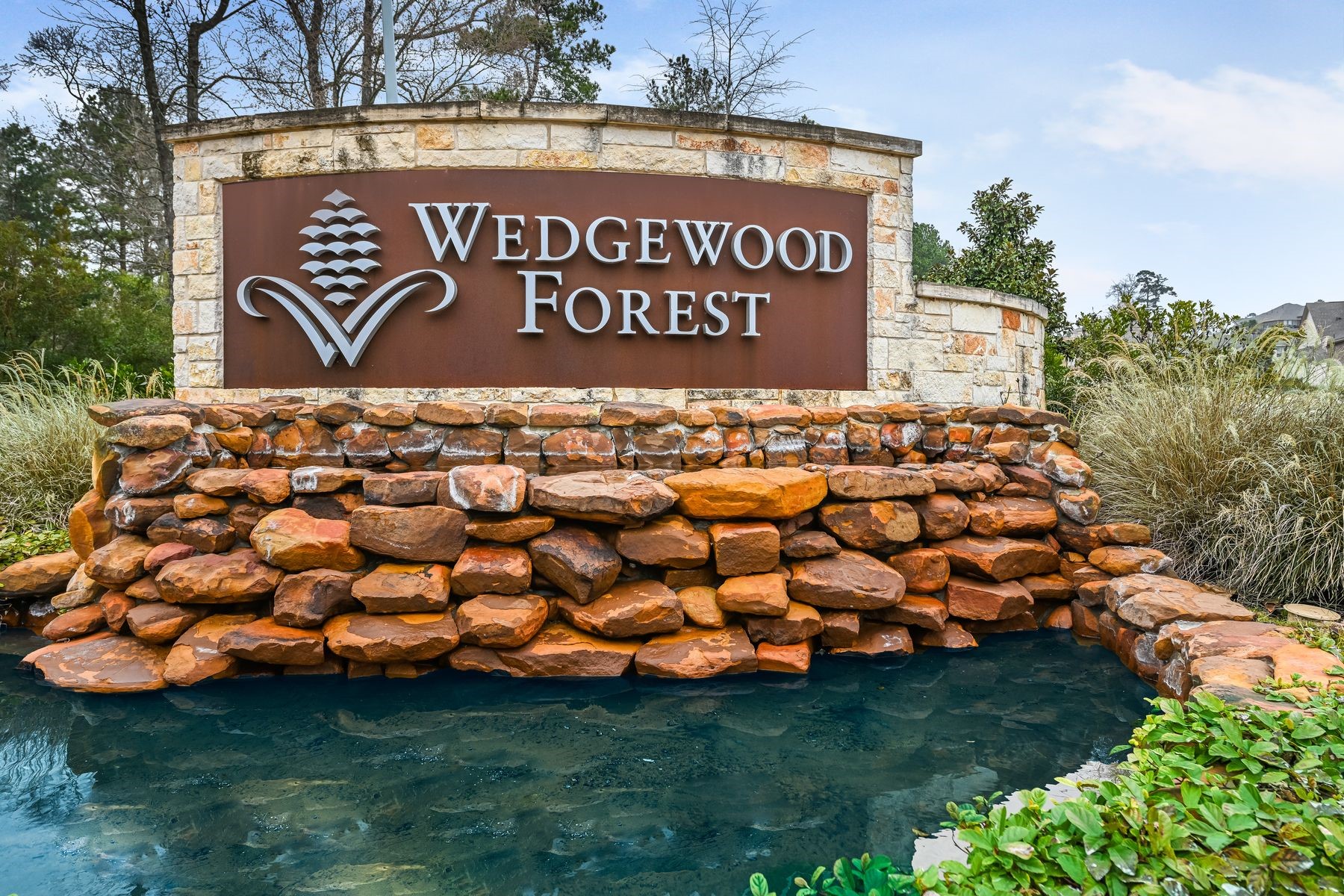 320 Red Maple Lane Conroe, TX 77304 - Photo 23 of 24 Main entrance to Wedgewood Forest subdivision