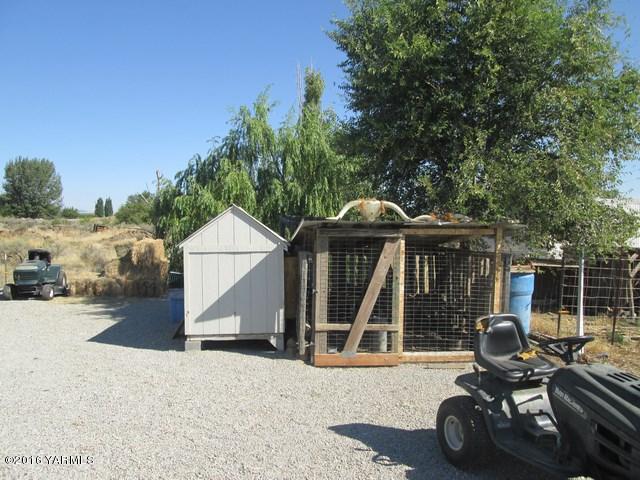 120751 Heck Road Prosser, WA 99350 - Photo 2 of 27 a view of backyard with deck and seating space
