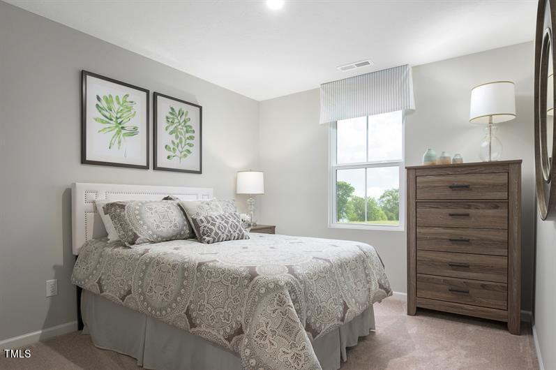 4150 Mantis Court Bailey, NC 27807 - Photo 8 of 11 a bedroom with a bed and a window