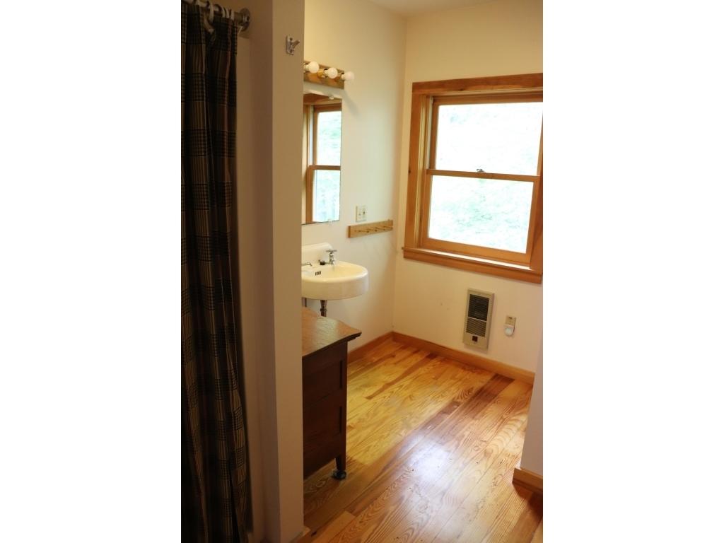 65 Pine Heath Road Bar Harbor, ME 04609 - Photo 13 of 31 13-master bath sink, side board and show