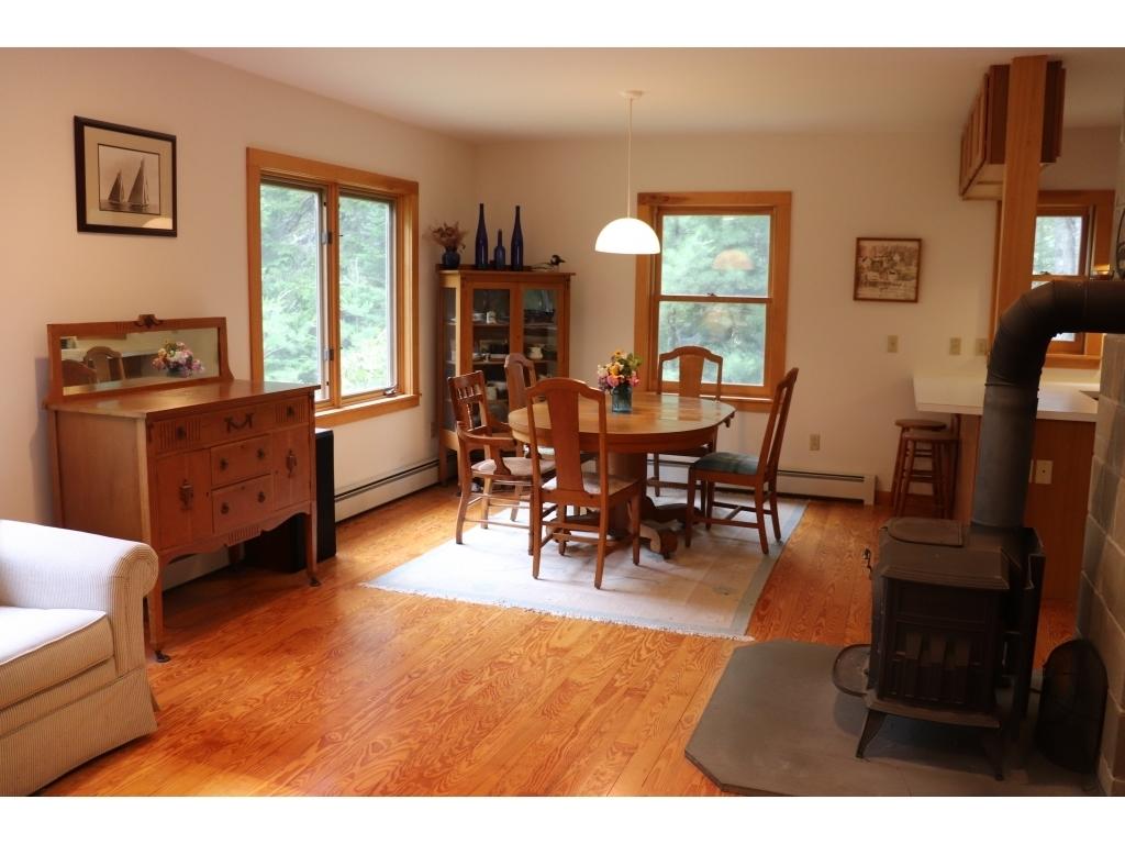 65 Pine Heath Road Bar Harbor, ME 04609 - Photo 5 of 31 05-dining area with window overlooking b