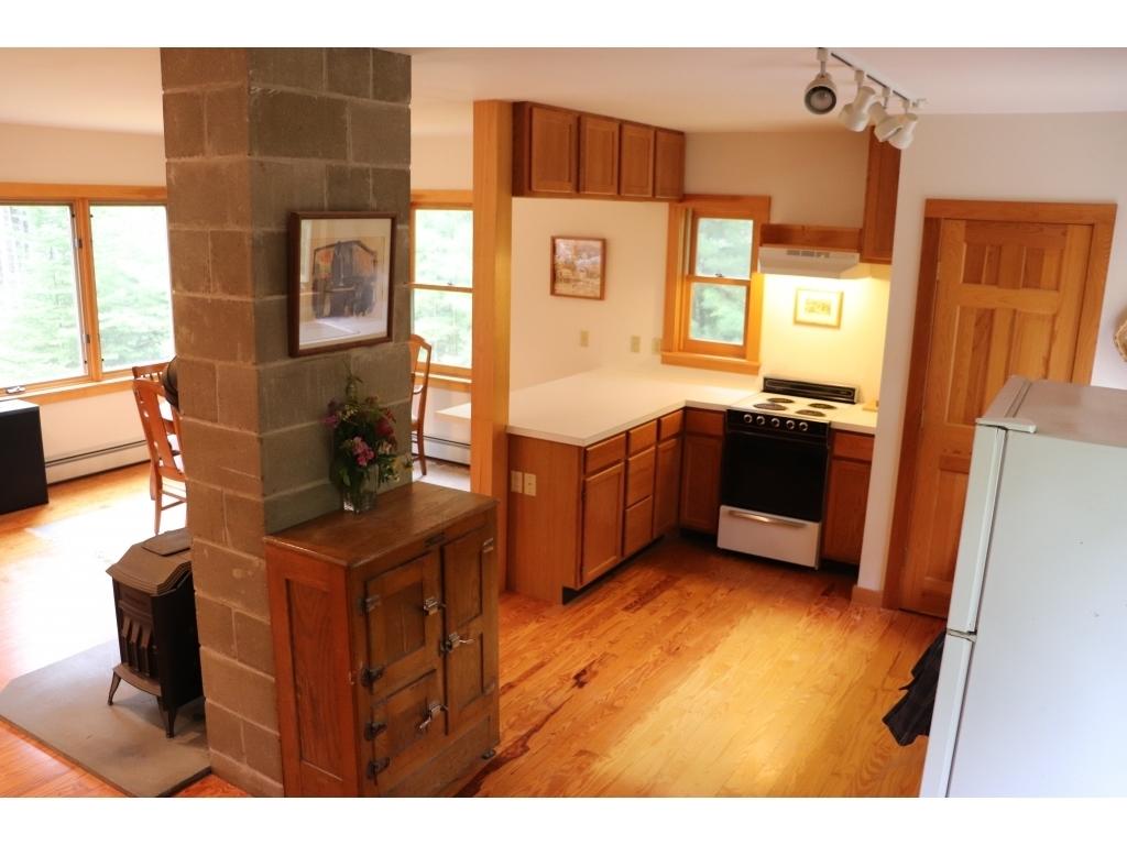 65 Pine Heath Road Bar Harbor, ME 04609 - Photo 9 of 31 09-kitchen dining area from stairway to