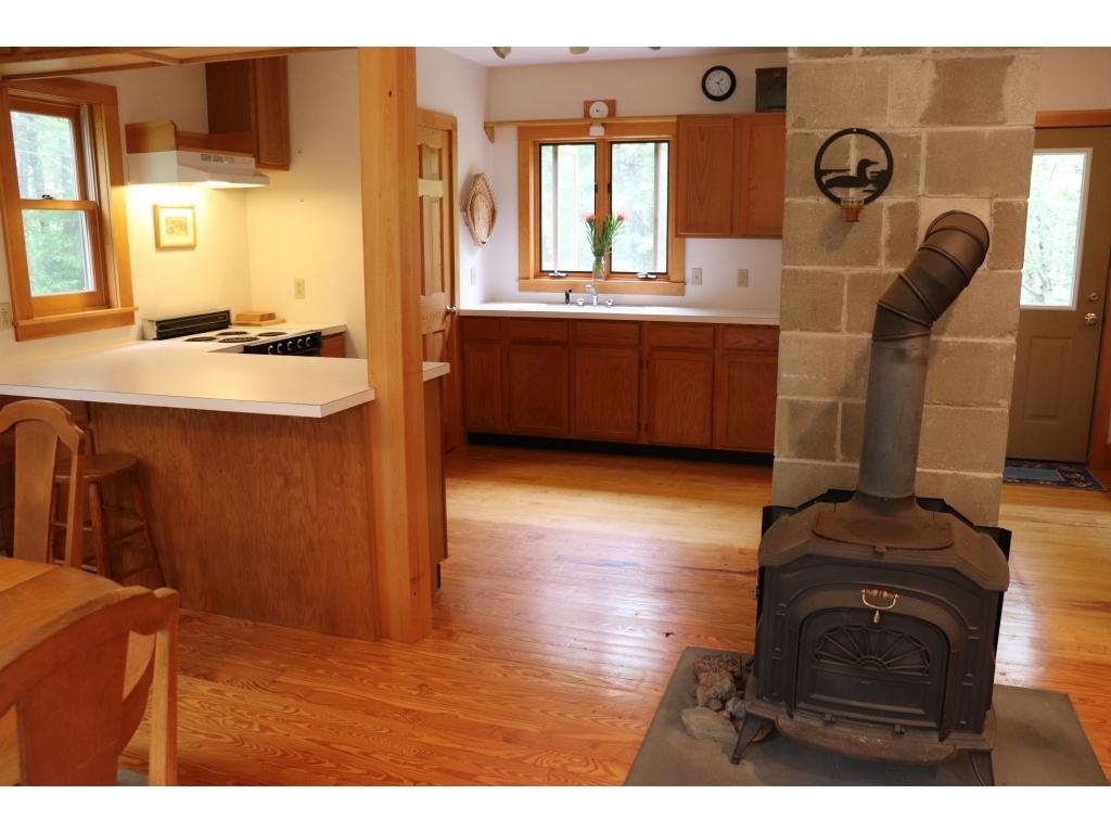 65 Pine Heath Road Bar Harbor, ME 04609 - Photo 10 of 31 10-kitchen looking out to front yard and