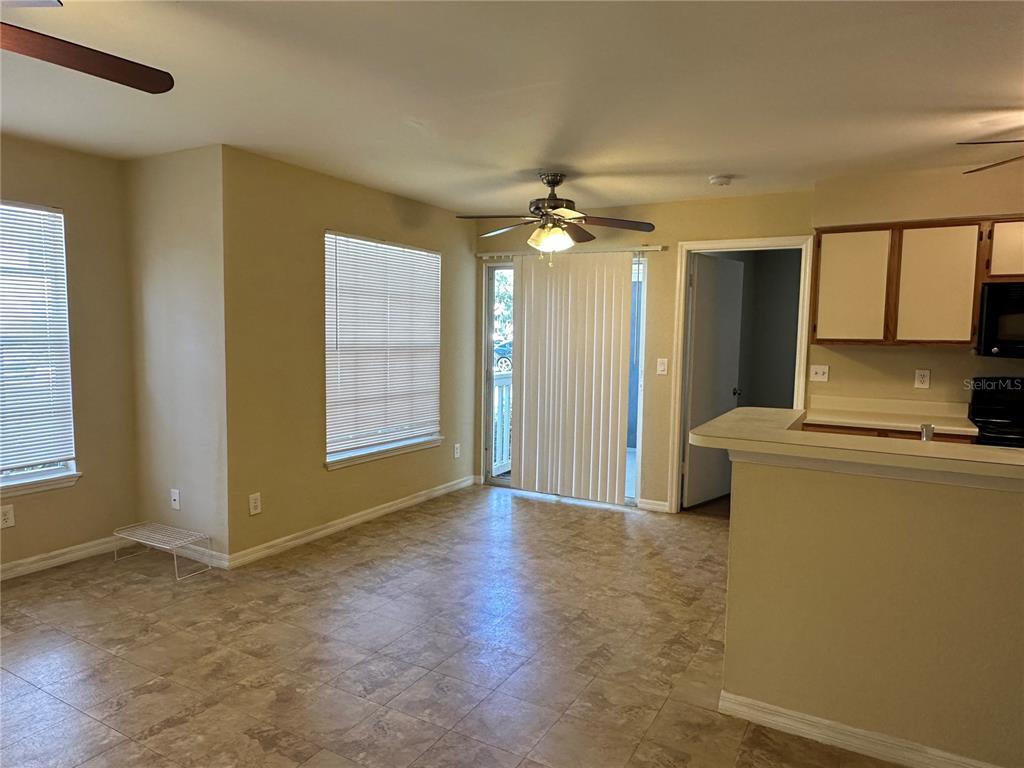1065 South Hiawassee Road, Unit 1417 Orlando, FL 32835 - Photo 5 of 13 a view of livingroom with workspace