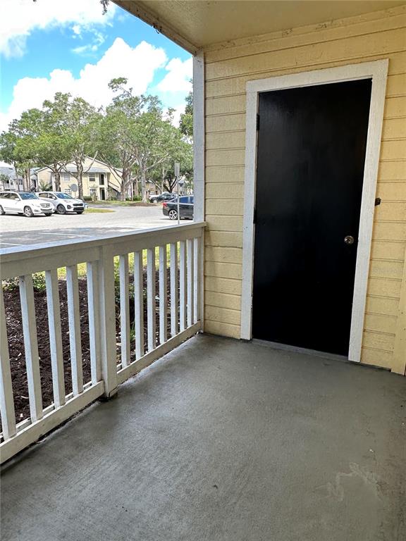 1065 South Hiawassee Road, Unit 1417 Orlando, FL 32835 - Photo 10 of 13 a view of a balcony with an outdoor space