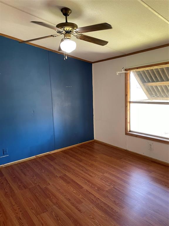 369 Private Road, Unit 4521 Wolfe City, TX 75496 - Photo 15 of 23 a view of an empty room with windows