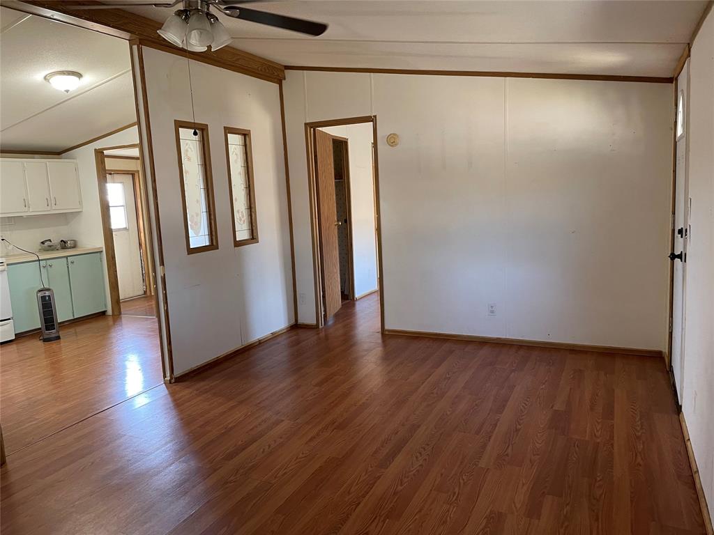 369 Private Road, Unit 4521 Wolfe City, TX 75496 - Photo 20 of 23 a view of entryway with wooden floor