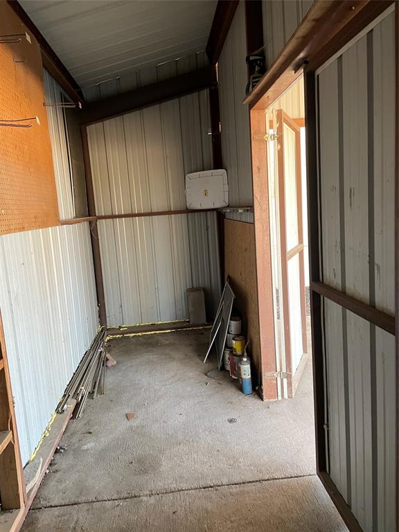 369 Private Road, Unit 4521 Wolfe City, TX 75496 - Photo 21 of 23 a view of a room with wooden floor and windows