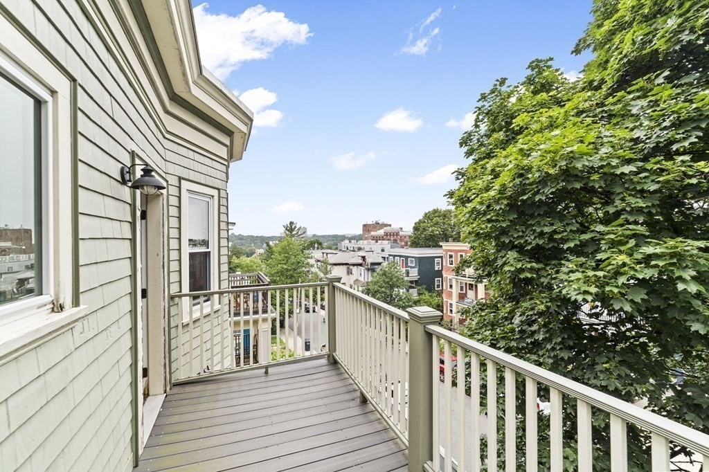 81 Montebello Road, Unit 3 Boston, MA 02130 - Photo 12 of 20 a view of a balcony with wooden floor