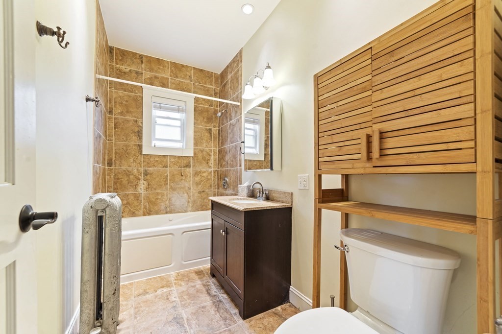 81 Montebello Road, Unit 3 Boston, MA 02130 - Photo 18 of 20 a bathroom with a sink toilet and shower