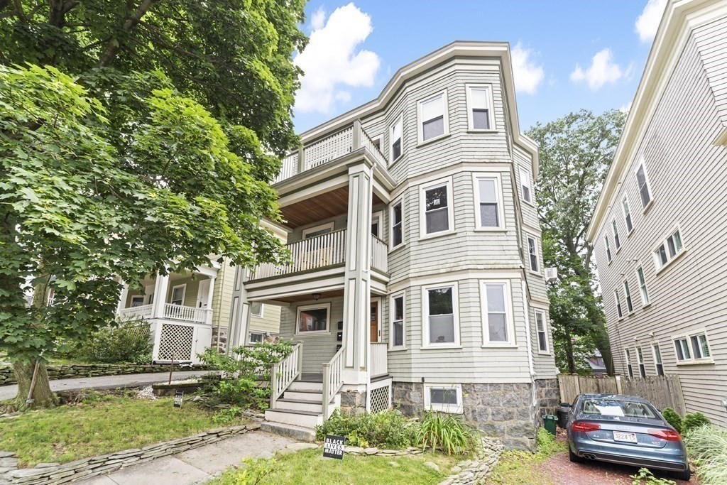 81 Montebello Road, Unit 3 Boston, MA 02130 - Photo 19 of 20 front view of a house with a street