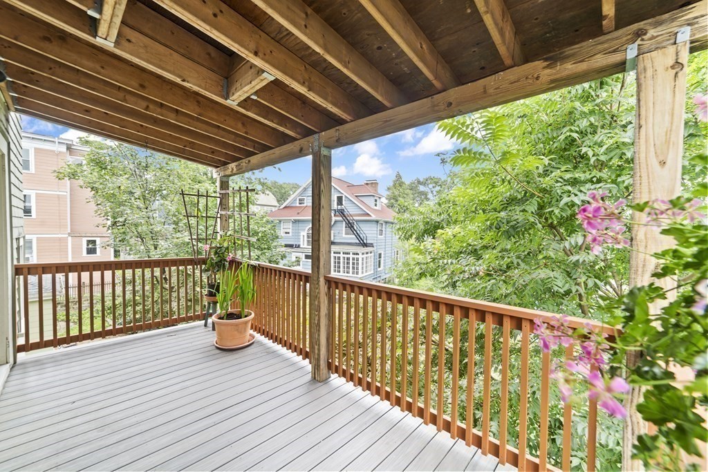 81 Montebello Road, Unit 3 Boston, MA 02130 - Photo 4 of 20 a view of balcony with wooden floor