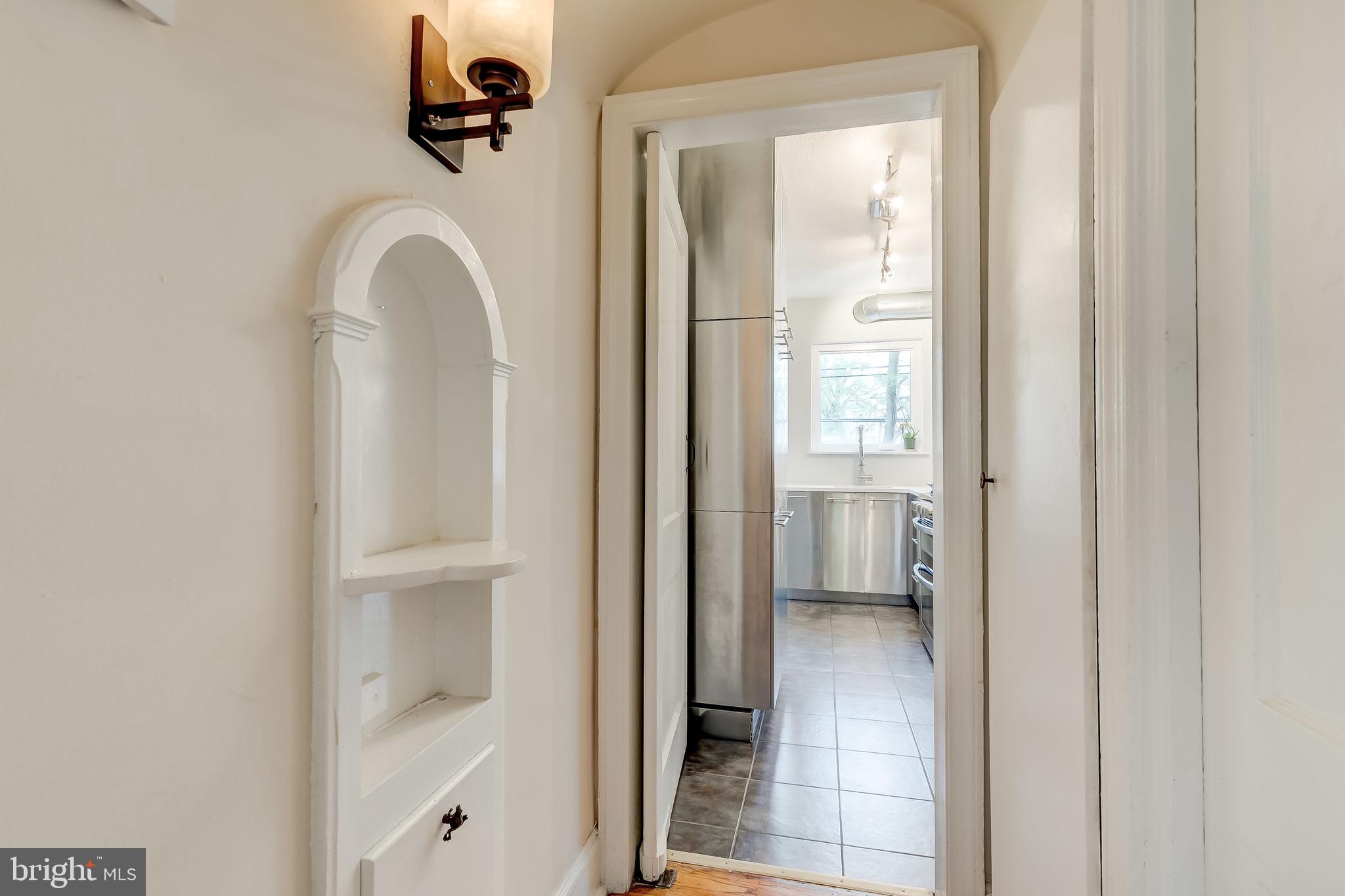 3630 Elkader Road Baltimore, MD 21218 - Photo 15 of 30 Original custom woodworking in hallway