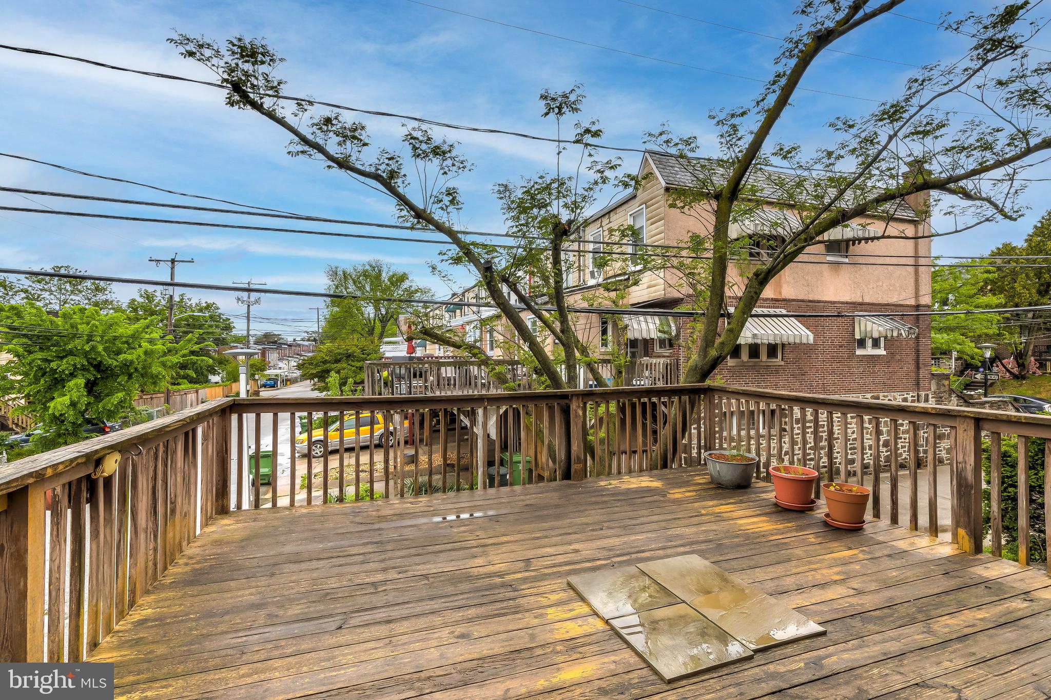 3630 Elkader Road Baltimore, MD 21218 - Photo 28 of 30 Expansive dining deck walk-out for 3 season living