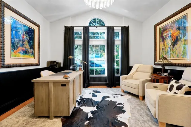 a view of a bathroom with a double vanity sink a mirror and a shower