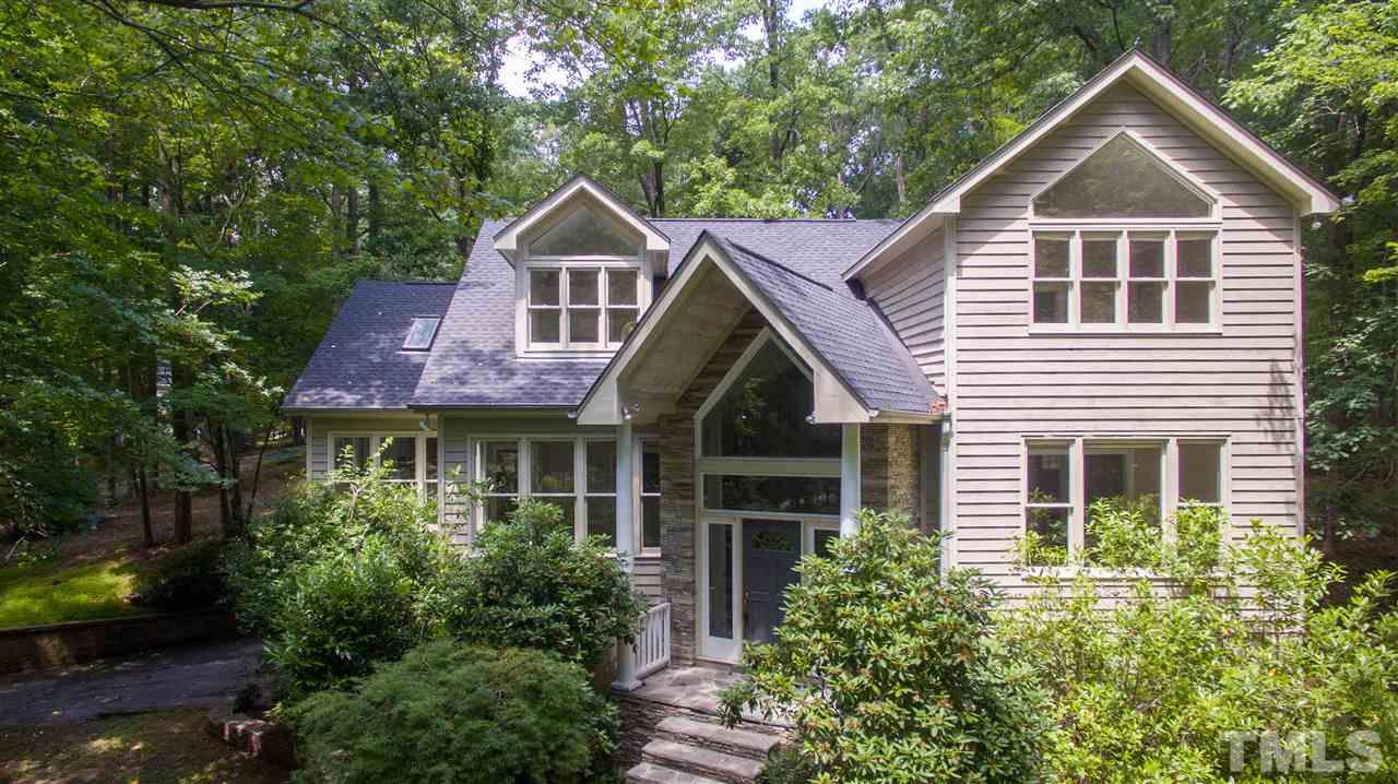 1700 Percheron Place Raleigh, NC 27613 - Photo 1 of 30 a front view of a house with a yard