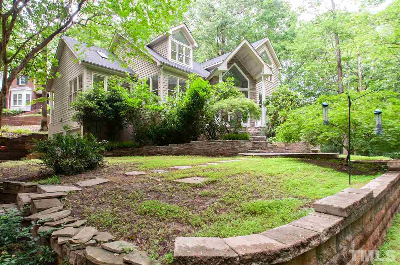 1700 Percheron Place Raleigh, NC 27613 - Photo 2 of 30 a front view of a house with garden