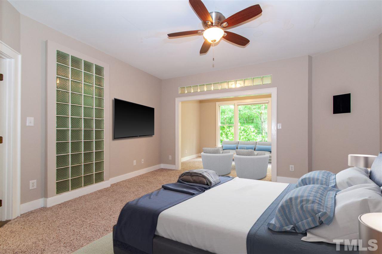 1700 Percheron Place Raleigh, NC 27613 - Photo 13 of 30 a bedroom with a bed and a window