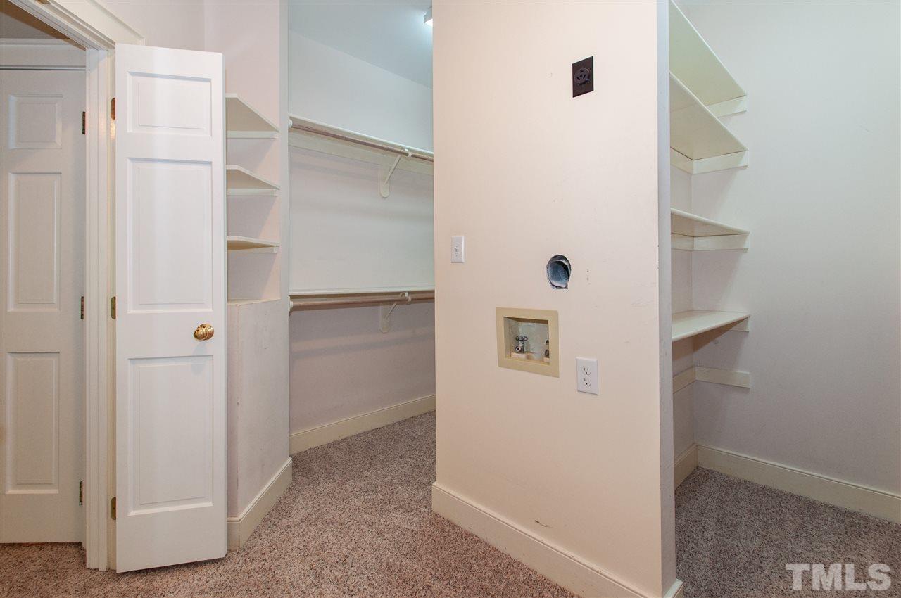 1700 Percheron Place Raleigh, NC 27613 - Photo 17 of 30 a view of a hallway with closet area