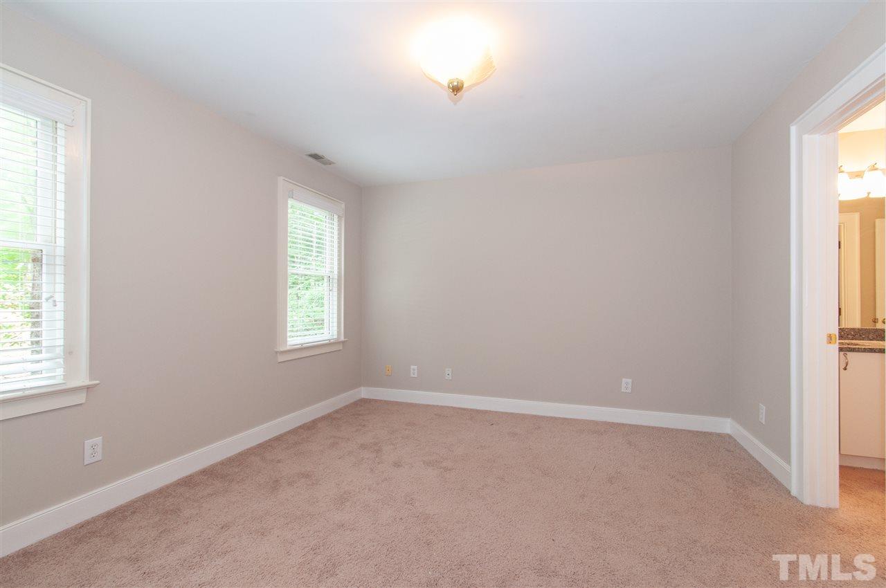 1700 Percheron Place Raleigh, NC 27613 - Photo 20 of 30 an empty room with windows