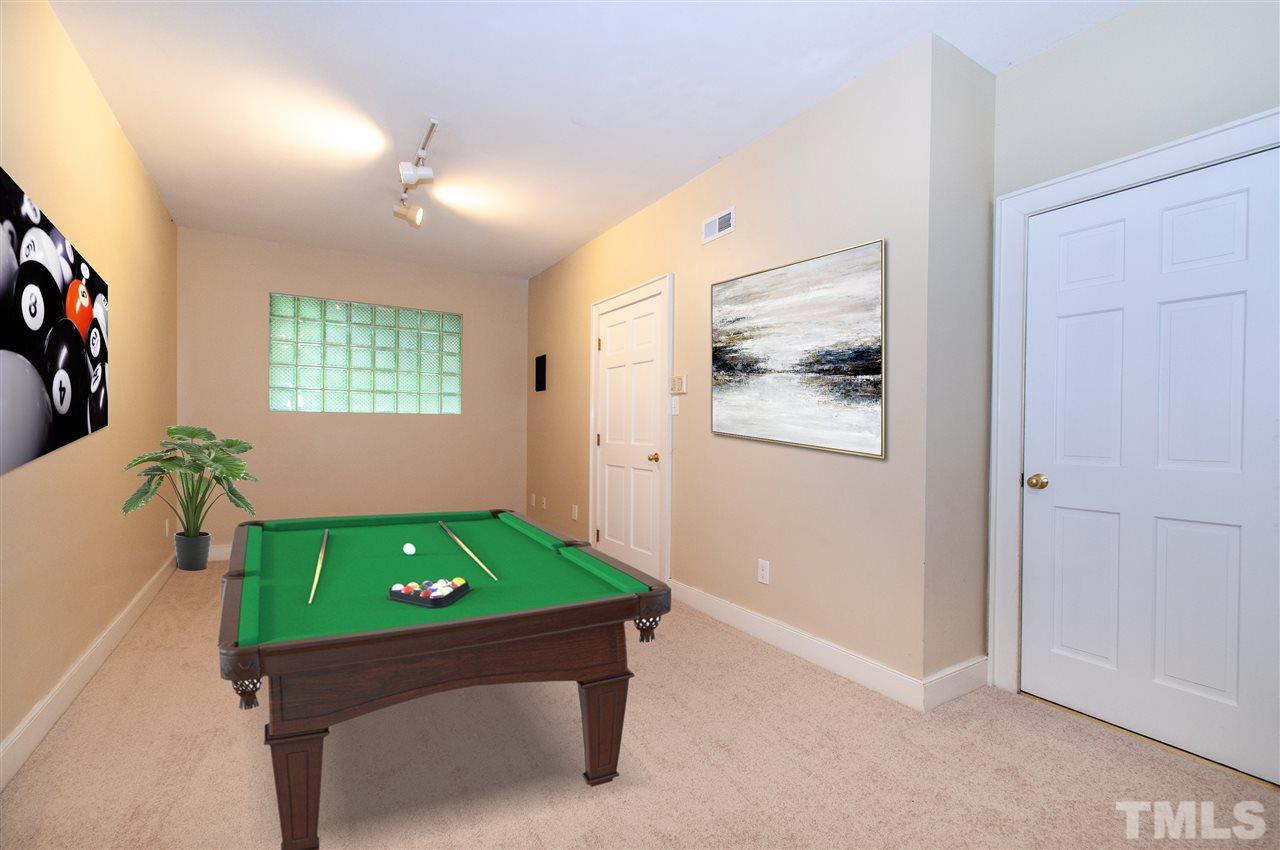 1700 Percheron Place Raleigh, NC 27613 - Photo 23 of 30 a room with pool table and windows