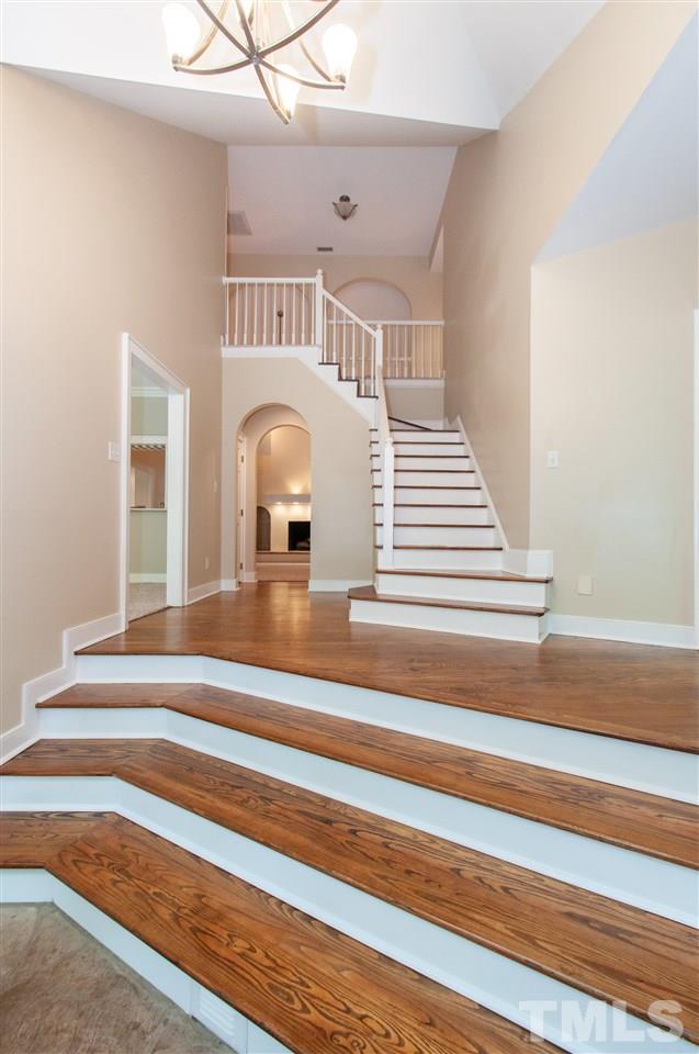 1700 Percheron Place Raleigh, NC 27613 - Photo 25 of 30 a view of entryway and hall with wooden floor
