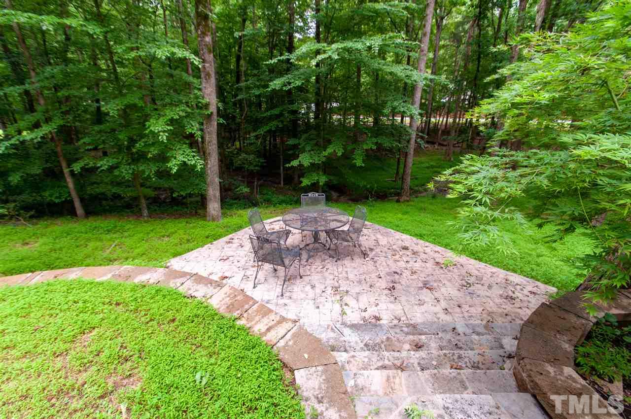 1700 Percheron Place Raleigh, NC 27613 - Photo 26 of 30 a view of a garden with a patio