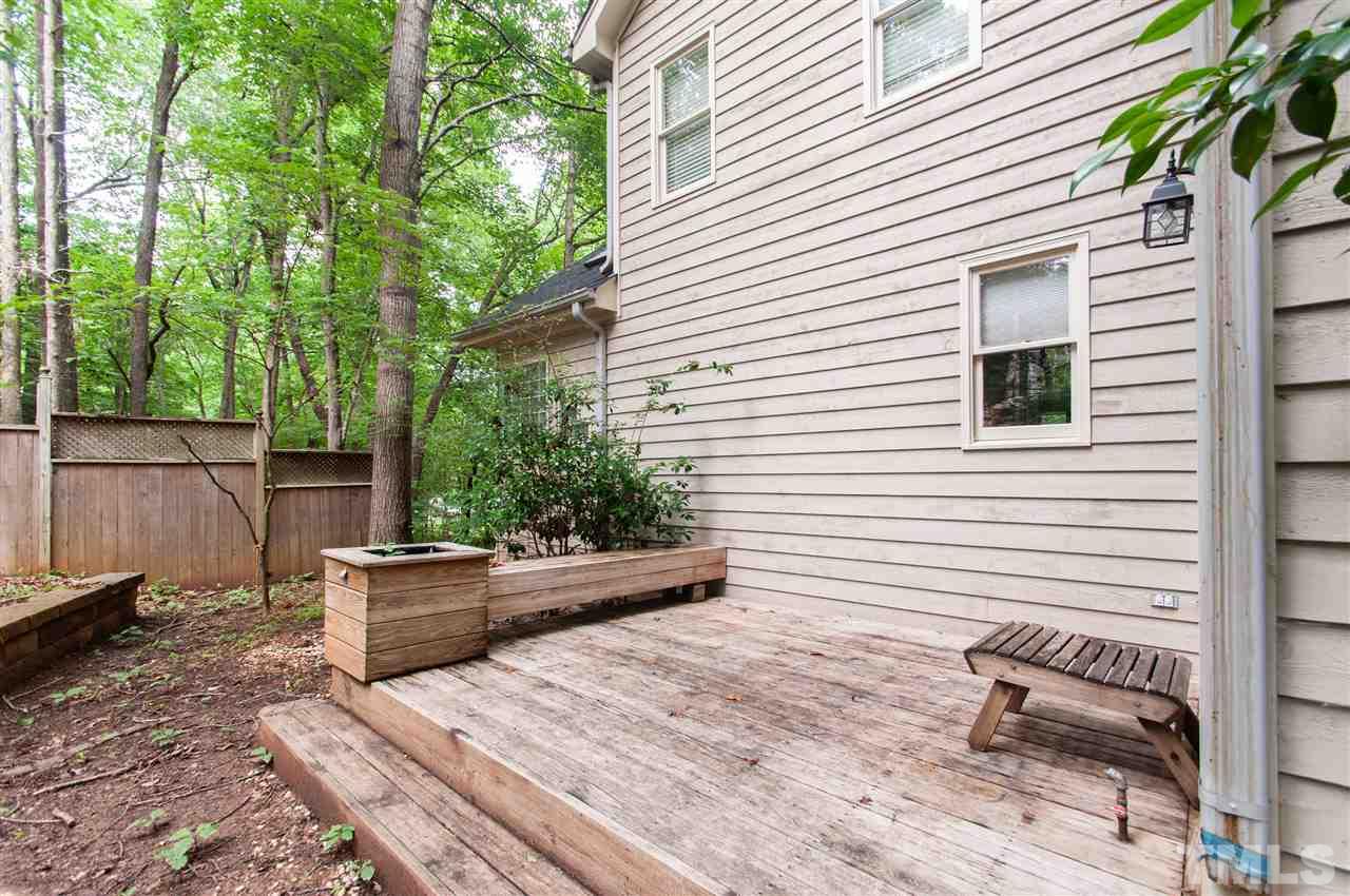 1700 Percheron Place Raleigh, NC 27613 - Photo 28 of 30 a backyard of a house with seating space