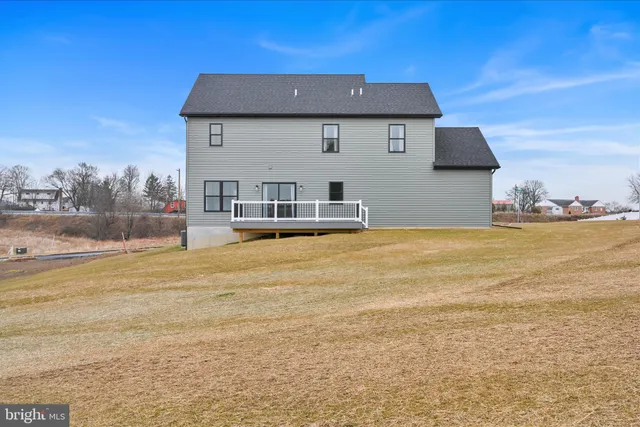 a view of a house with a ocean view