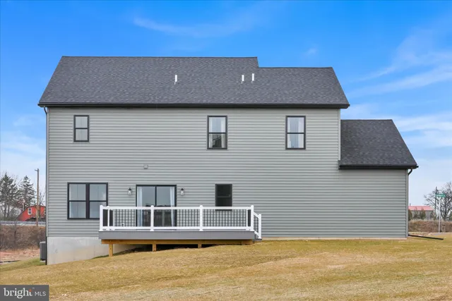 a view of a house with swimming pool
