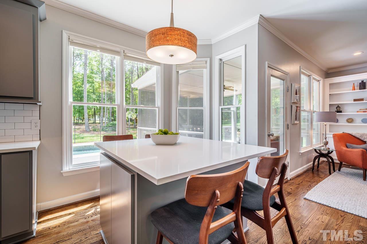 325 Morris Road Pittsboro, NC 27312 - Photo 12 of 39 a view of a dining room with furniture window and outside view