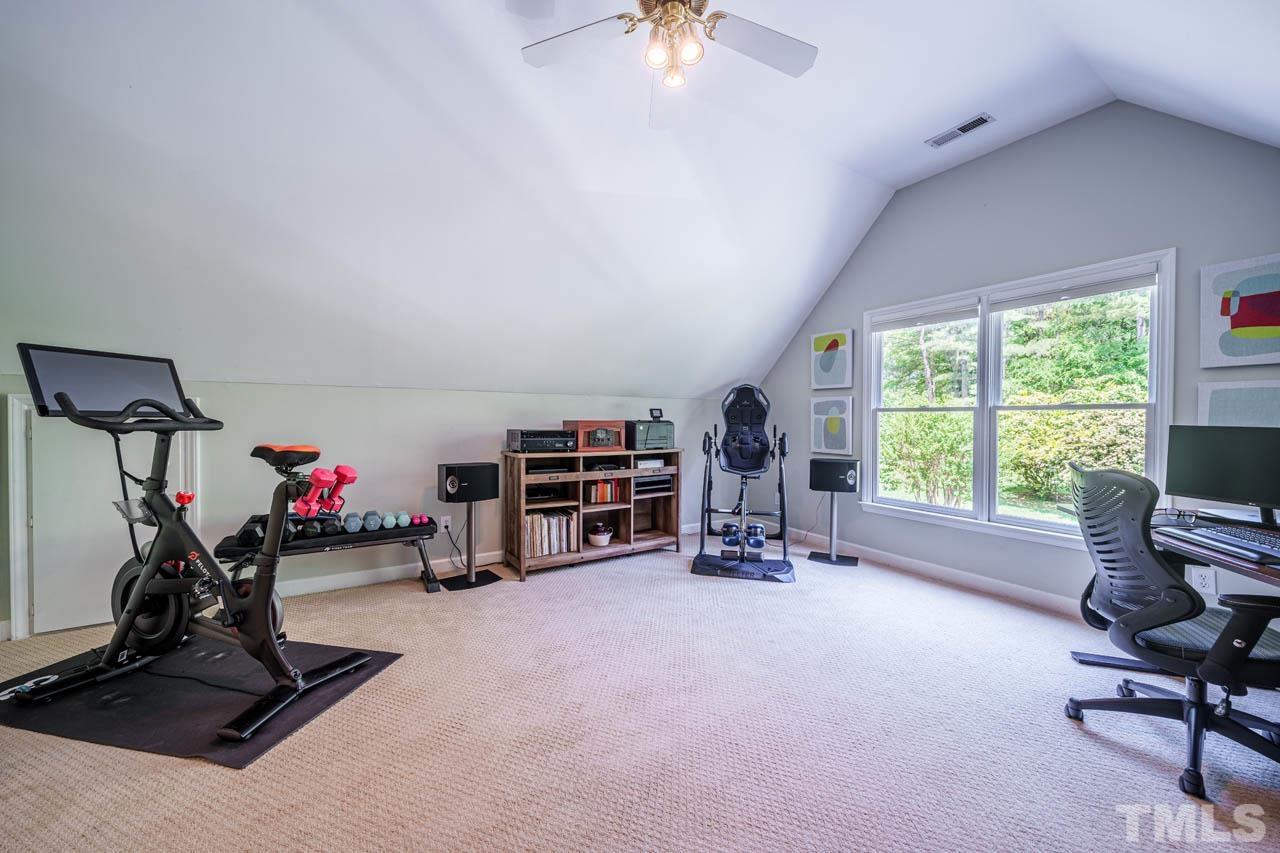 325 Morris Road Pittsboro, NC 27312 - Photo 24 of 39 a view of a room with gym equipment