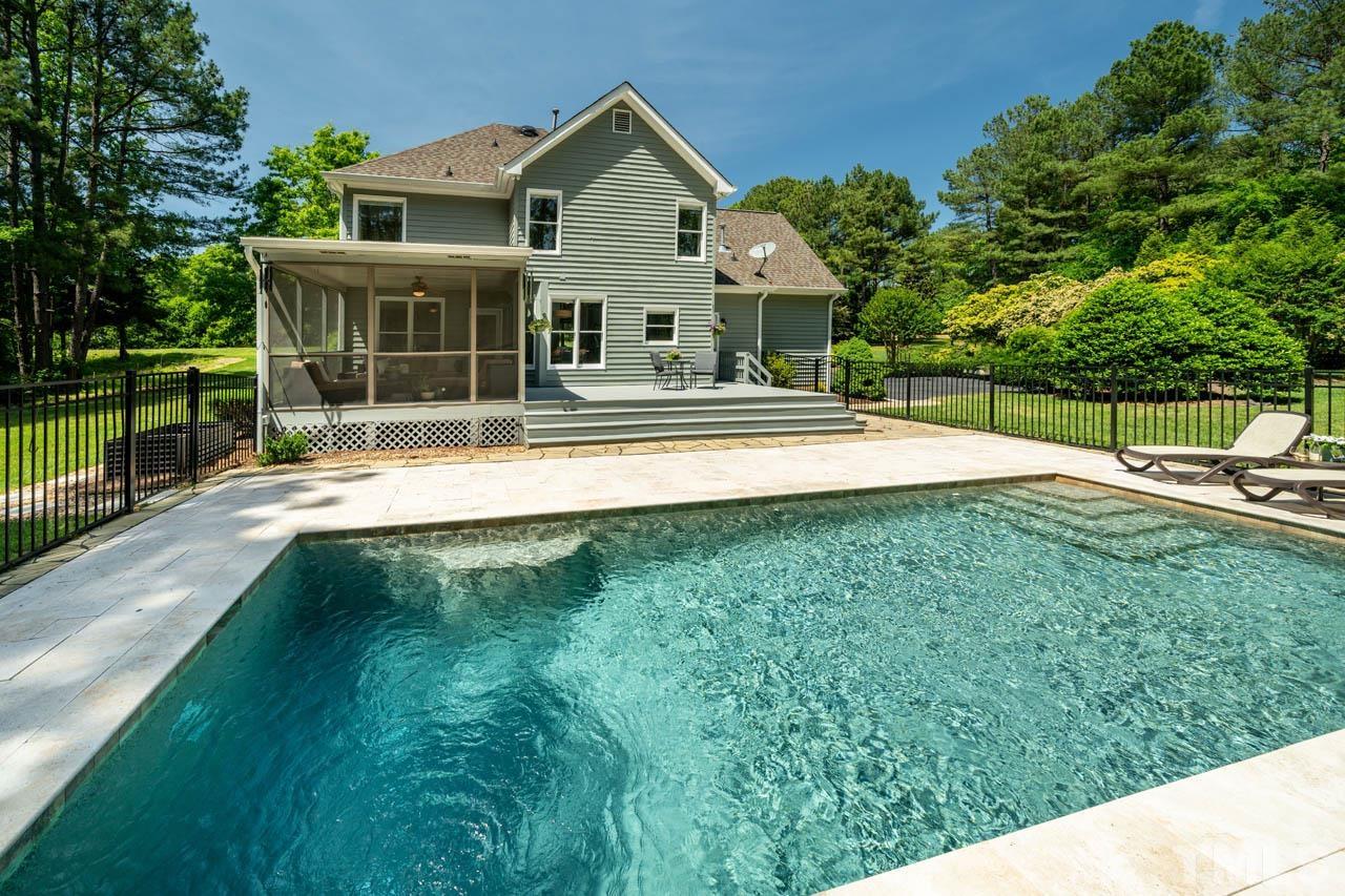 325 Morris Road Pittsboro, NC 27312 - Photo 29 of 39 a view of house with outdoor space and swimming pool