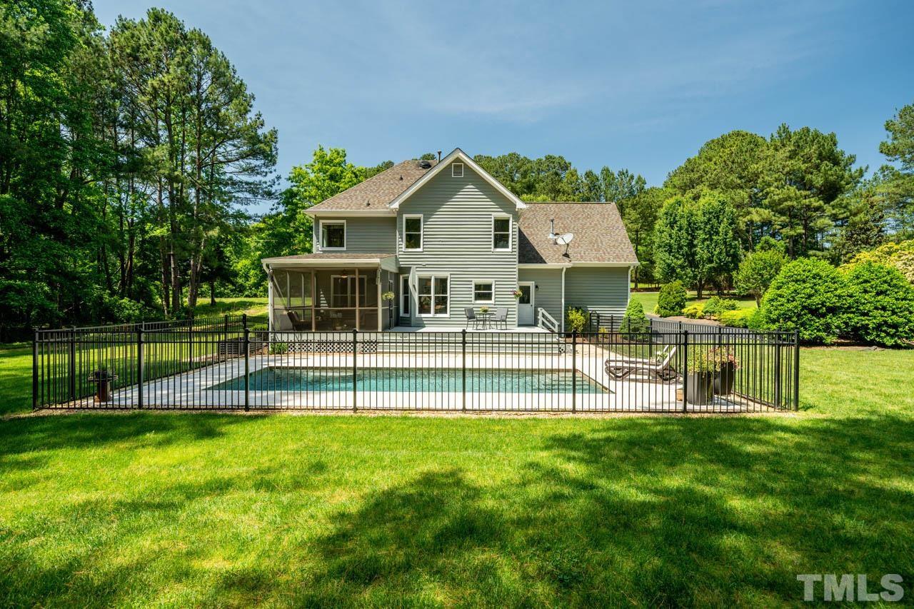 325 Morris Road Pittsboro, NC 27312 - Photo 35 of 39 a view of an house with a big yard and large trees