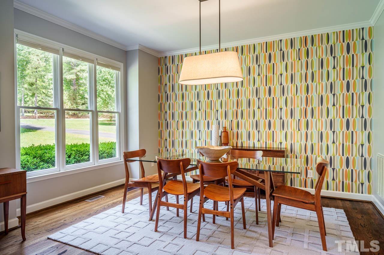 325 Morris Road Pittsboro, NC 27312 - Photo 5 of 39 a dining room with furniture and wooden floor