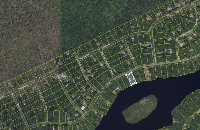 a view of a balcony with chairs